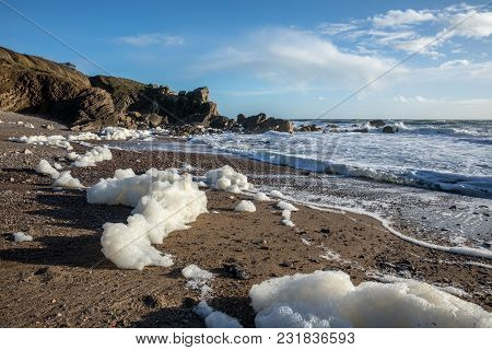 Sea Foam Created By The Agitation Of Seawater On The Beach Of Cayola (les Sables D Olonne, France)