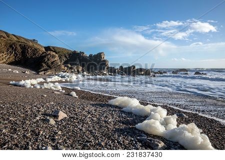 Sea Foam Created By The Agitation Of Seawater On The Beach Of Cayola (les Sables D Olonne, France)