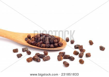 Granules Of Bee Bread In A Wooden Spoon Are Isolated On A White Background. Apitherapy. Beekeeping P