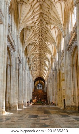 WINCHESTER, UK - JUN 8, 2013: Nave looking east towards the choir of Winchester Cathedral, one of the largest cathedrals in Europe