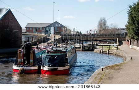 Two Barges Approach The Locks In Wigan