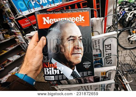 Paris, France - Mar 19, 2017: Man Reading Buying Newsweek Magazine Featuring Benjamin Netanyahu Aka 