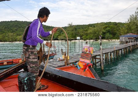 Koh Rong Sanloem, Cambodia - 22 January 2018: Sailor At The Mooring With The Ship On Koh Rong Sanloe