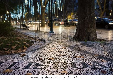 Detail Of The Beautiful Portuguese Pavement At The Liberdade Avenue In The City Of Lisbon, Portugal,