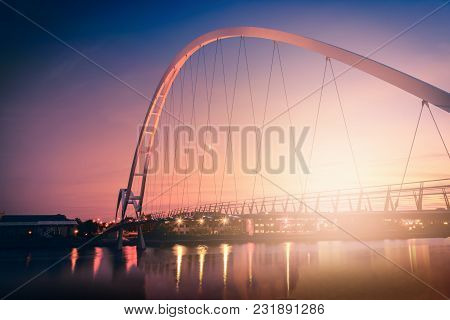 Infinity Bridge On Dramatic Sky At Sunset In Stockton-on-tees, Uk.
