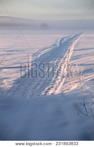 Road Over The Lake Menstraesket In Vaesterbotten, Sweden