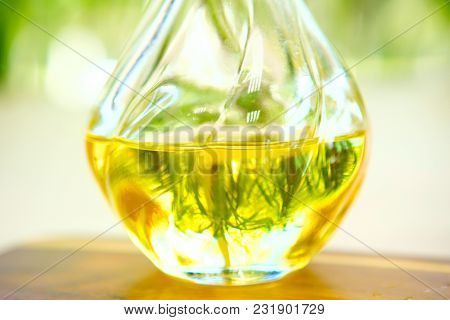 Olive Oil On Wooden Surface. Sunny Day.