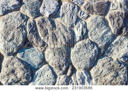 Fragment Of A Wall Made Of Stone. Stone Wall. Fragment Of A Wall Made Of Stone. Stone Wall.