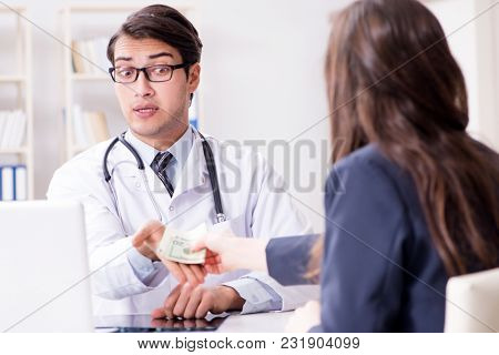 Doctor in corruption concept with being offered bribe