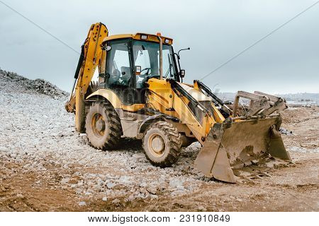 Details On Construction Site, Backhoe Loader With Exacavator