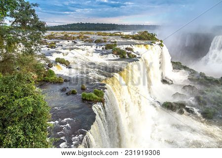Tourists At Iguassu Falls At Iguassu National Park, World Natural Heritage Site By Unesco