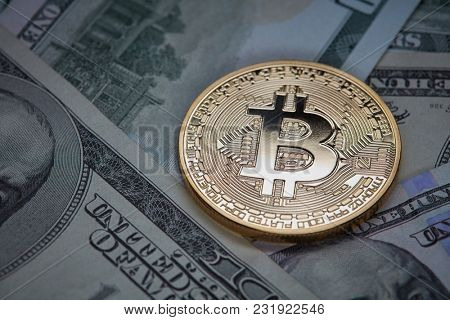 Dollar bills and gold coin bitcoin. Cryptocurrency business concept.