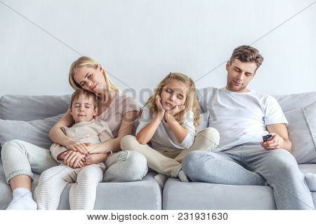 Bored Family Fell A Sleep While Watching Movie At Home On Weekend