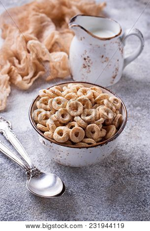 Sweet Cereal Loops In Bowl. Corn Flakes For Breakfast. Selective Focus