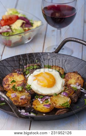 Sunny Side Up Egg On Groestl With Wine