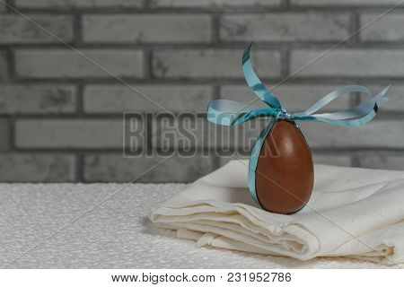 Delicious Seasonal Chocolate Easter Egg With A Ribbon