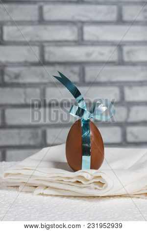 Delicious Seasonal Chocolate Easter Egg With A Ribbon
