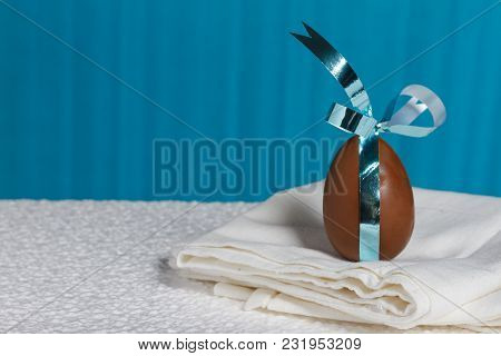 Delicious Seasonal Chocolate Easter Egg With A Ribbon