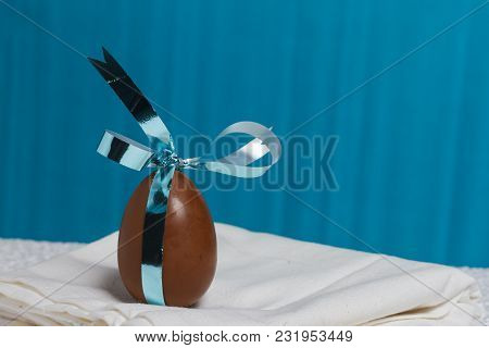 Delicious Seasonal Chocolate Easter Egg With A Ribbon