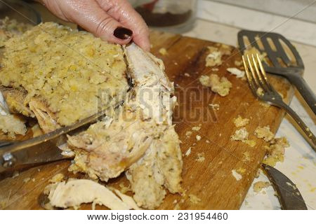 Homemade Stuffed Capon On Wooden Cutting Board