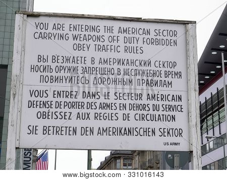 Berlin, Germany-october, 6, 2017:entering The American Sector Sign At Checkpoint Charlie In Berlin, 