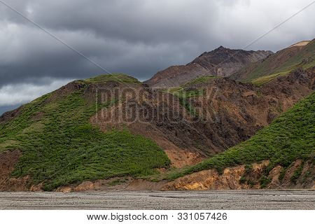 The White Dots In The Center Of The Photo Are Dall Sheep In Dwnali National Park In Alaska.
