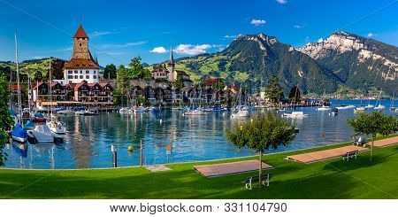 Spiez Church And Castle On The Shore Of Lake Thun In The Bernese Oberland Region Of The Swiss Canton