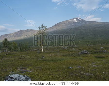 Colorful Mountain Sanjartjakka With Kaitumjaure Mountain Hut And Beautiful Wild Lapland Nature Lands