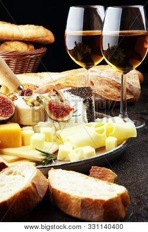 Different Sorts Of Cheese. Cheese Platter With Different Cheese And Spice