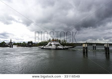 The Ferry Boat For Vehicles Transportatian Across The River