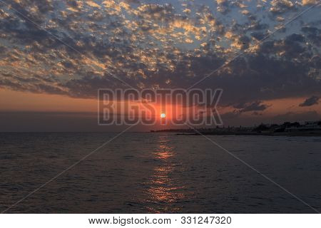 Sunrise Over The Sea In Kokkini Hani, Crete, Greece. Scenic Seaside Landscape In The Morning.