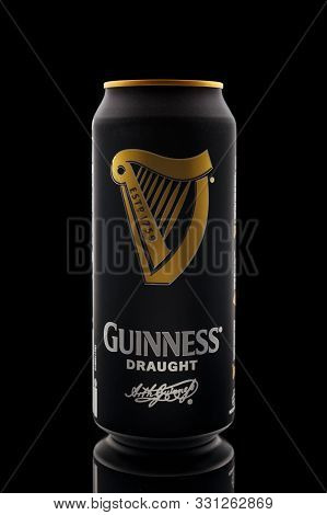Guinness Draught Popular Irish Beer In Aluminium Can On A Black Background, Devon, United Kingdom, O