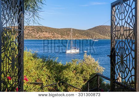 Beautiful Mediterranean Coast With Islands, Mountains And Yachts In The Blue Sea