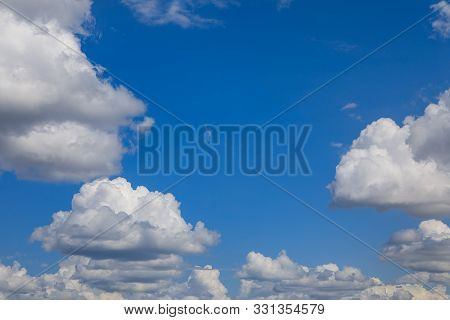 Bright Sunny Day, Cloudscape Full Of White Fluffy Cummulus Clouds