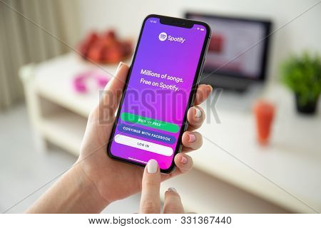 Anapa, Russia - July 21, 2019: Woman Holding Iphone X With Music Service Spotify On The Screen. Ipho