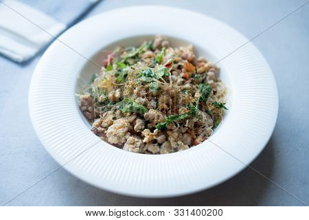 Stir Fried Vermicelli With Minced Pork And Vegetable (climbing Wattle ) Or (cha-om) Leave. Thai Food