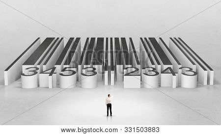 Young businessman standing in front of a big codebar