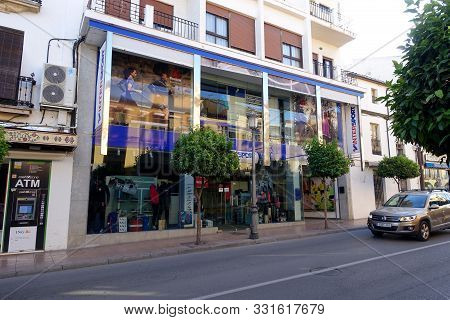 Ronda, Spain 30 October 2019: A Branch Of The Sports Shop Intersport In The Centre Of The Town Of Ro