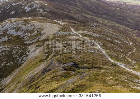 Hiking With Trail, Rocks And Vegetation At Croagh Patrick Mountain