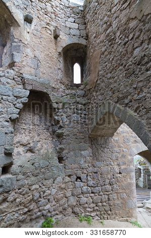 Ruins Of Medieval Castle Ortenbourg  Inside. Walls With Empty Windows And  Loopholes. Alsace Region,