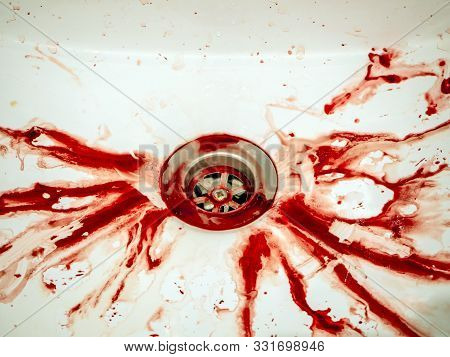 Blood Stains In Bathroom In White Ceramic Sink, Bleeding, Criminal And Suicide Concept. Splashes Of 
