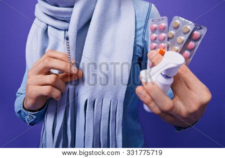 Man Standing With Pills Inhaler And Syringe In Hands