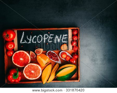 Fruits And Vegetables Containing Lycopene. Healthy Vegan Food Background. Lycopene Is A Red Caroteno