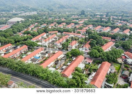 Caotun, Taiwan - October 31th, 2019: aerial view of street scenery with old house and trees at Zhongxing New Village, Nantou, Taiwan