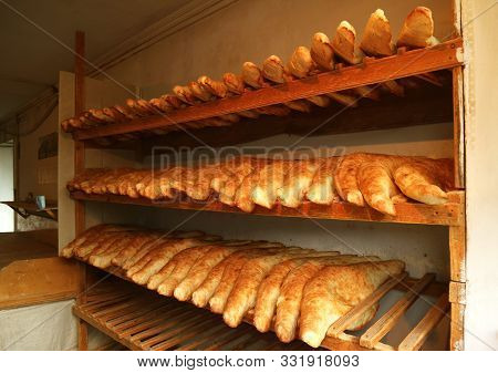 Many Of Traditional Georgian Bread Called Shotis Puri Or Shoti On The Wooden Lack Of A Local Bakery 