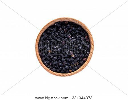 Dried Sambucus Berries In Wooden Cup On White Background.