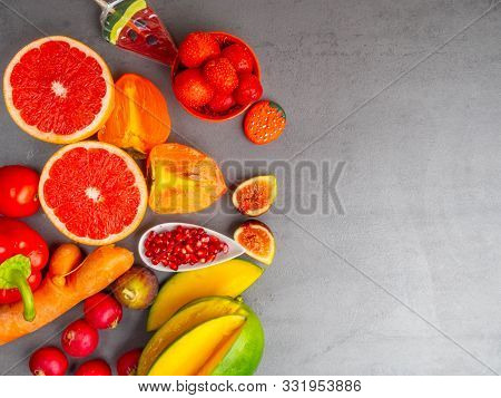 Fresh Red, Orange, Yellow Fruit And Vegetables Rich In Antioxidants, Fiber, Alfa Carotene, Lycopene,