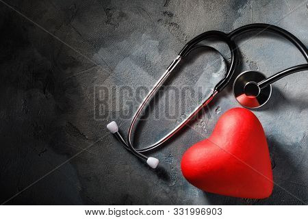 Medical Equipment And Heart-shaped Object On The Table With Copy Space, Top View