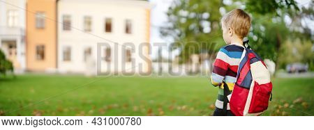 Cute Child With Backpack Going To The School. The Concept Of Self-dependence, Studying And Knowledge