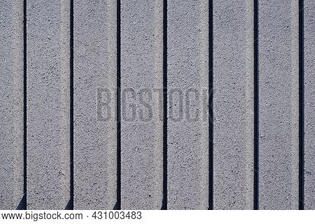 Vibro-pressed Concrete Curb On A Pallet. Concrete Gray Curb Surface.
